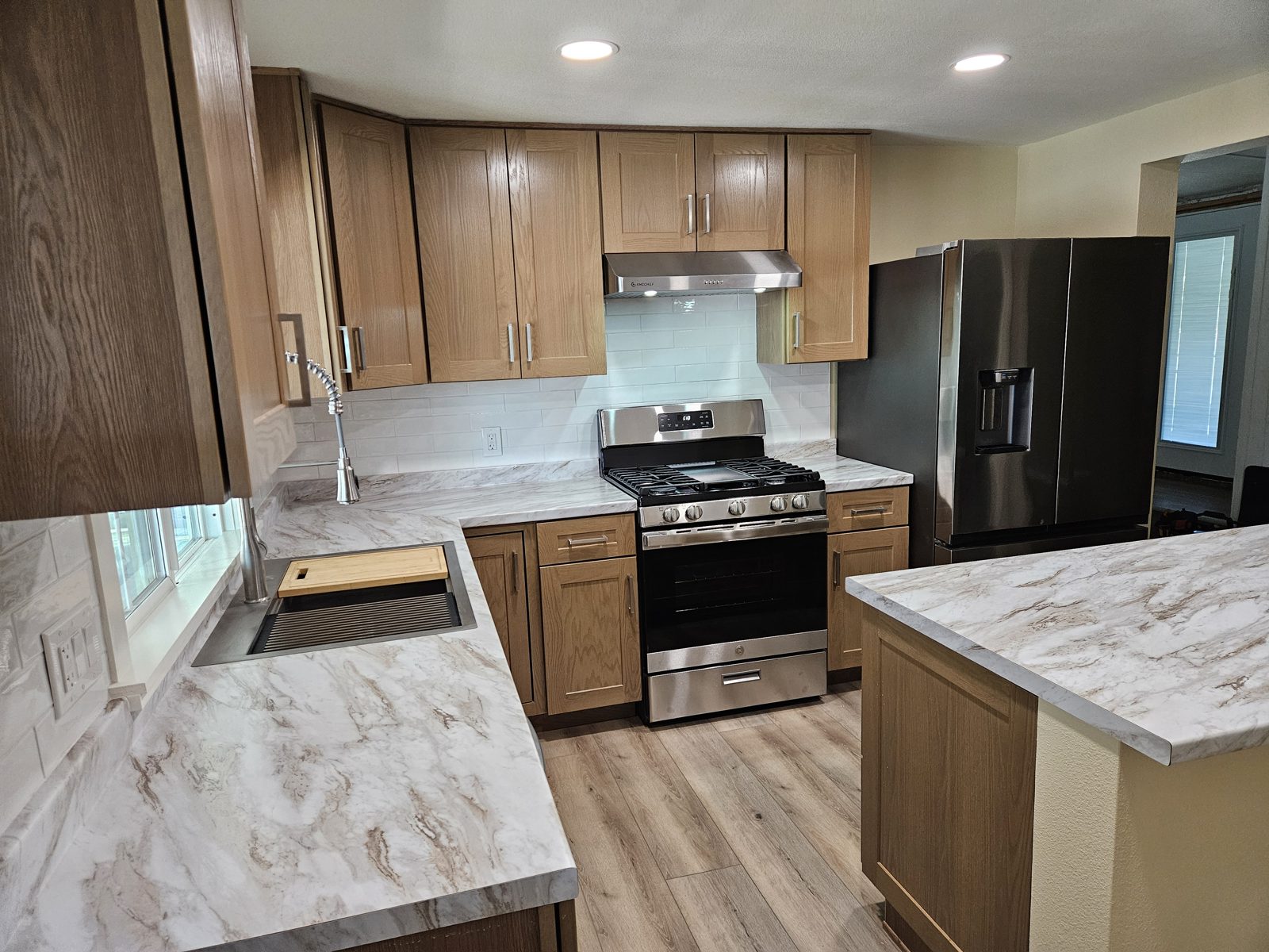 Complete kitchen remodel with new cabinets, quartz counters and stainless appliances in Yucaipa, CA
